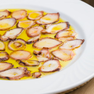 Flamed dry octopus with extra virgin olive oil